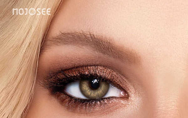close-up of a dark brown eye wearing Rich Girl Brown colored contact lenses