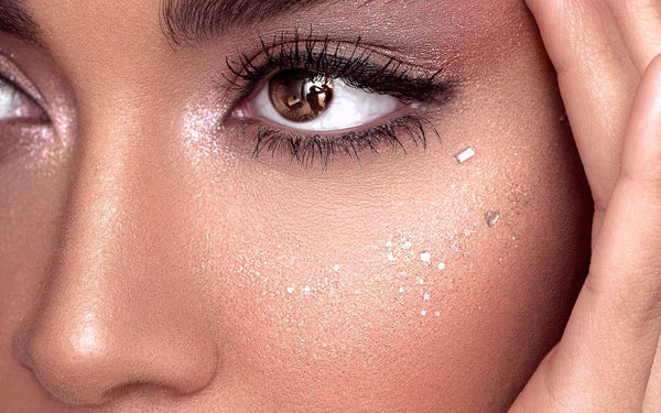Polished event makeup with warm brown eyes in close-up