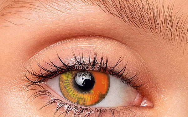 Zenitsu amber-gold lens worn on a real eye