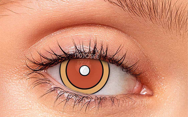 Orange patterned cosplay contact lens on an open eye