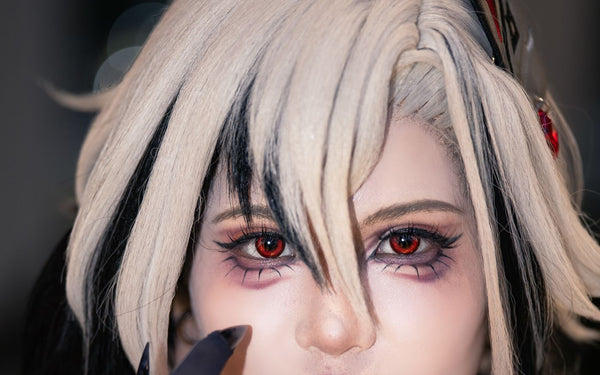 anime cosplayer wearing crimson red costume contact lenses, dark and silver styling