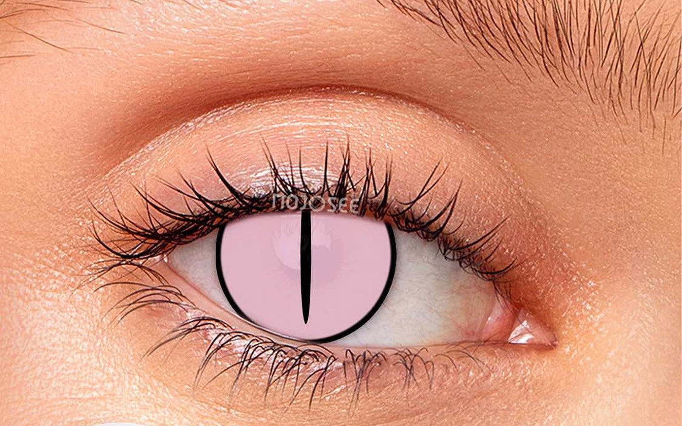 Pink slit-pupil contact lens on an open eye