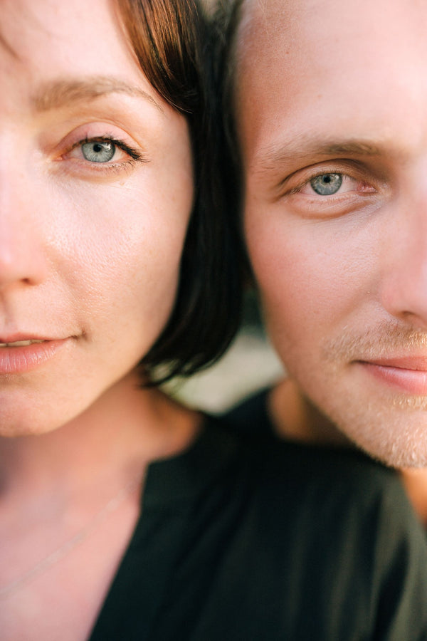 Close-up of a couple's faces side by side
