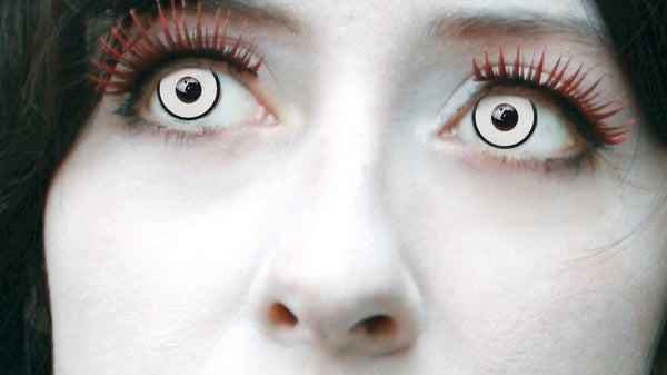 White-face clown makeup with white-out contact lenses, horror beauty portrait