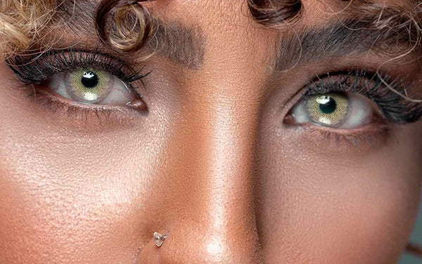model wearing Ocean Cyan Gray colored contact lenses, cool gray-green eyes