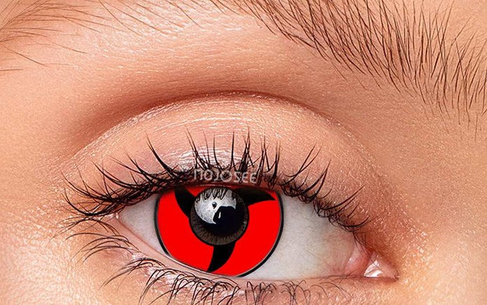 Itachi Mangekyō pinwheel lens worn on a real eye