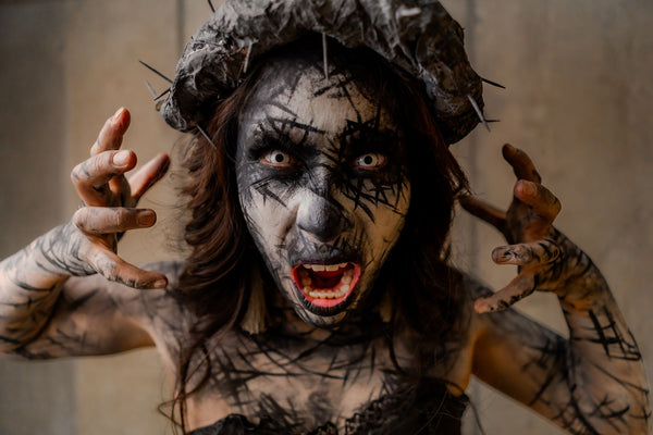 Dramatic portrait with surreal horror makeup
