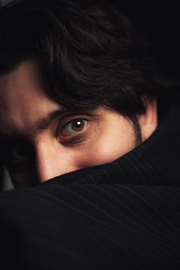 Moody close-up portrait of a man with an intriguing gaze