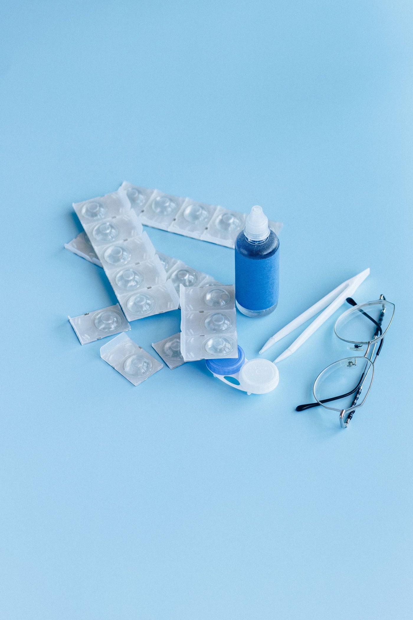 Contact lens care items including solution, case and glasses