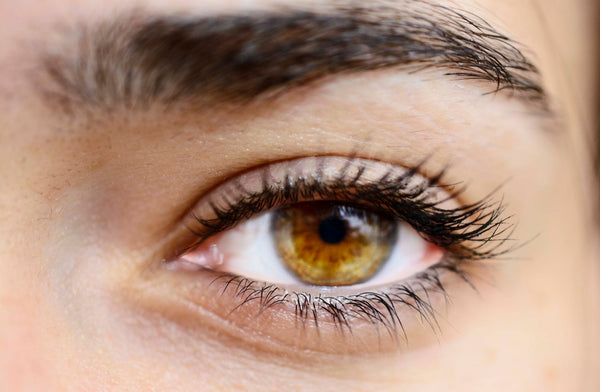Close-up of a woman's natural hazel eye
